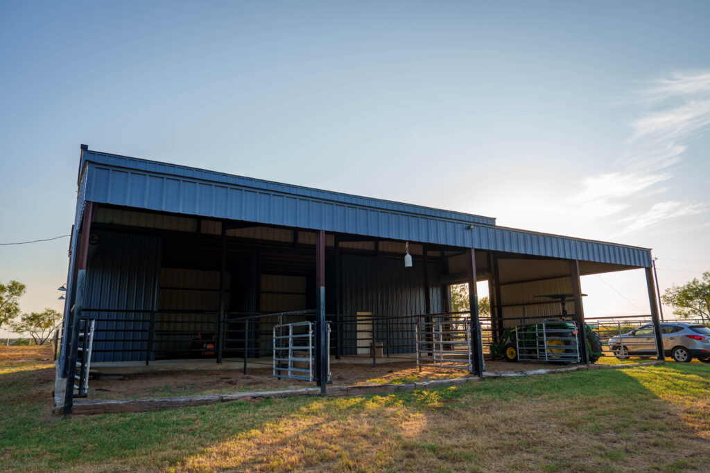 Metal equipment shop next to the home in Poteet, Texas
