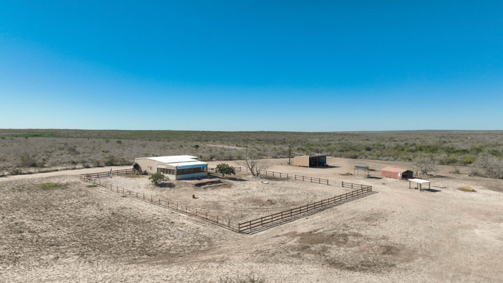 Aerial view of the barndominium camp on Valle Solitario Ranch