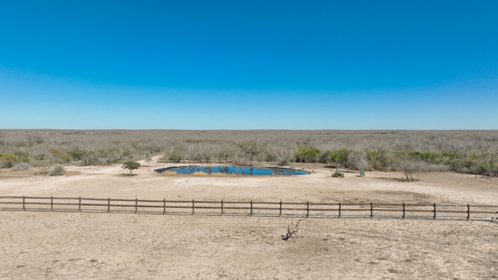 Pond fed by a water well on Valle Solitario Ranch
