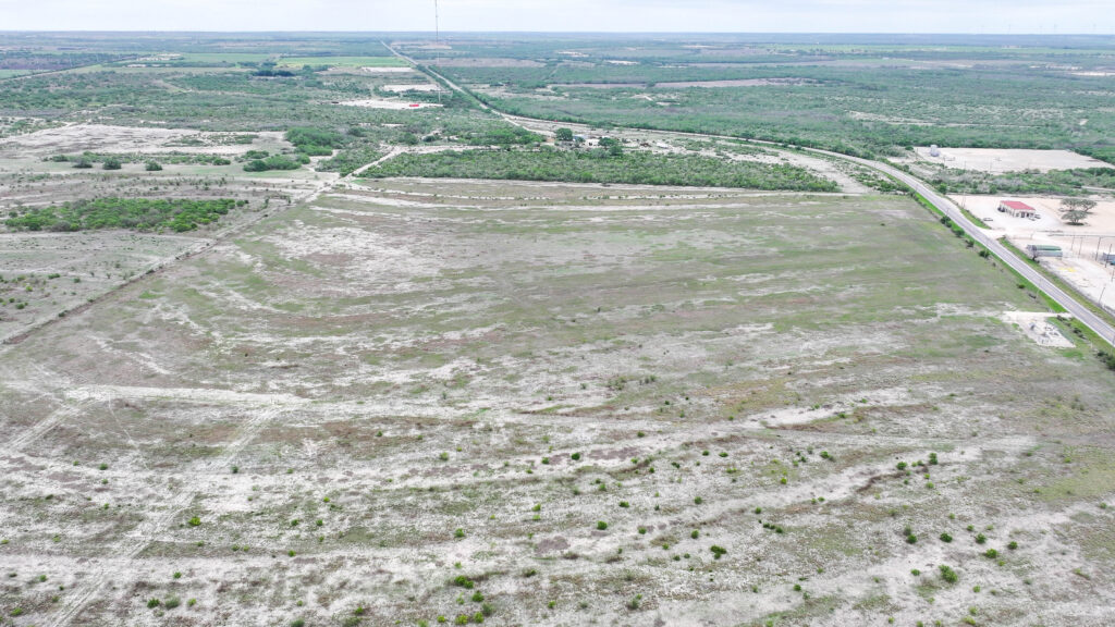 Aerial view of open pasture on Three Rivers Development Tract