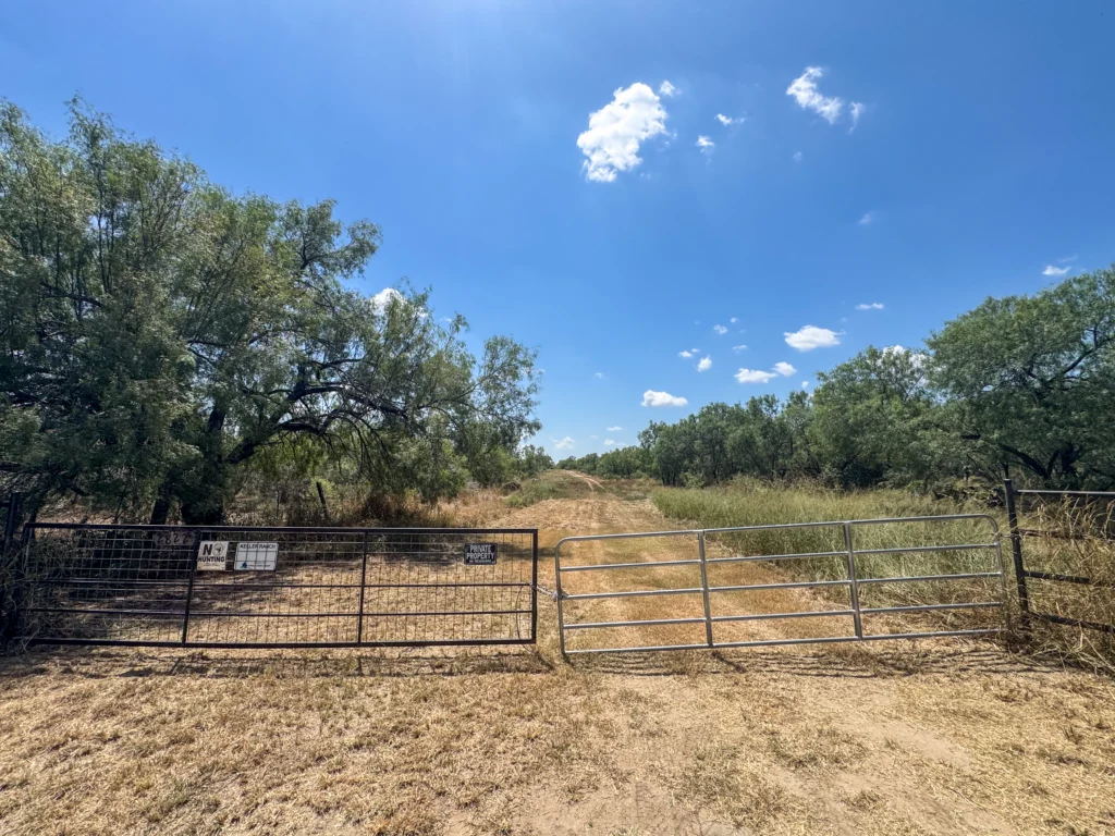 Entry gate off Tomblin Road at Sand Branch Homestead
