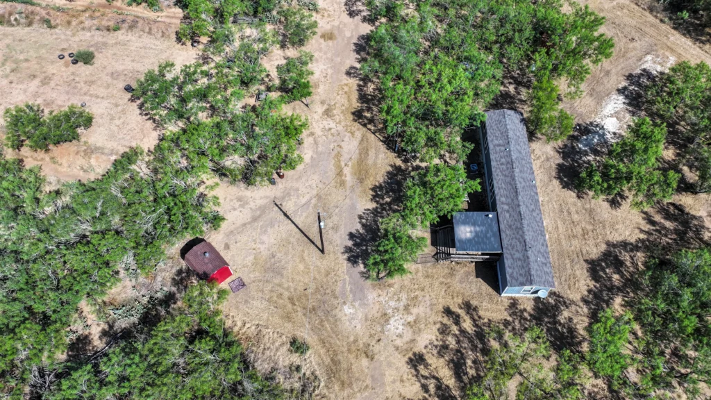 Aerial view of the home and shed at Sand Branch Homestead