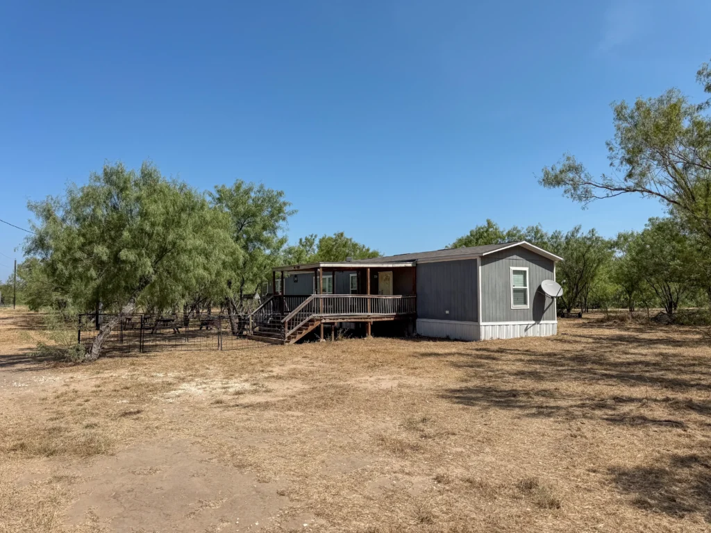 Manufactured home with front deck at Sand Branch Homestead